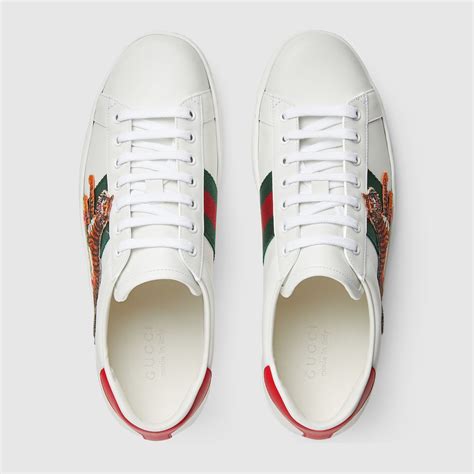 gucci sneakers tiger fake|gucci tiger button up.